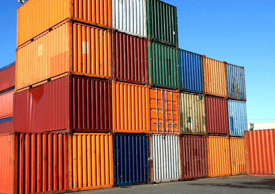 Stacked containers of a colorful variety.