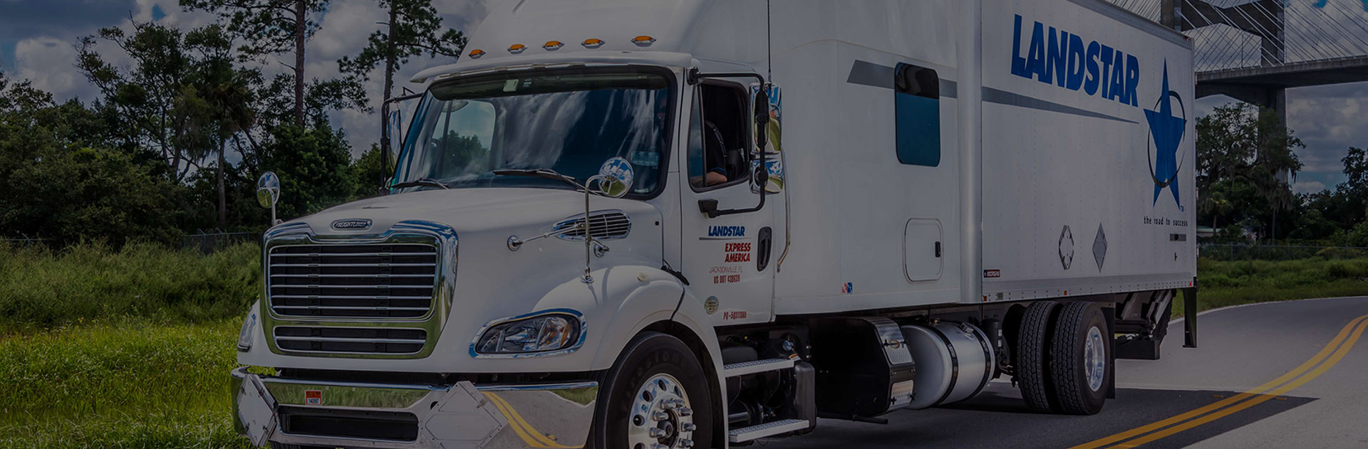 Image of a Landstar truck transporting shipments to their destination.